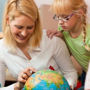 Kids learning about geography at school