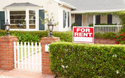 home with for rent sign out front