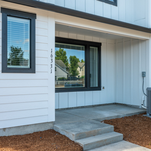 Close-up of front patio of townhome at Grove at 162nd