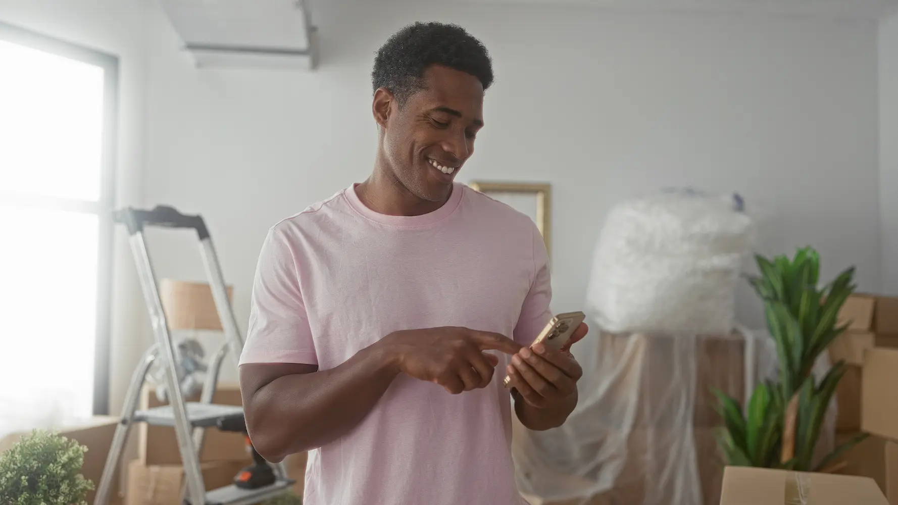 property owner looking over landlord resources on his smartphone