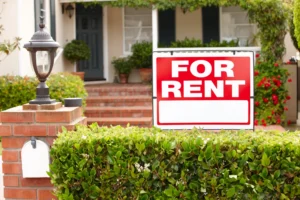 SW WA house with a 'For Rent' sign in front